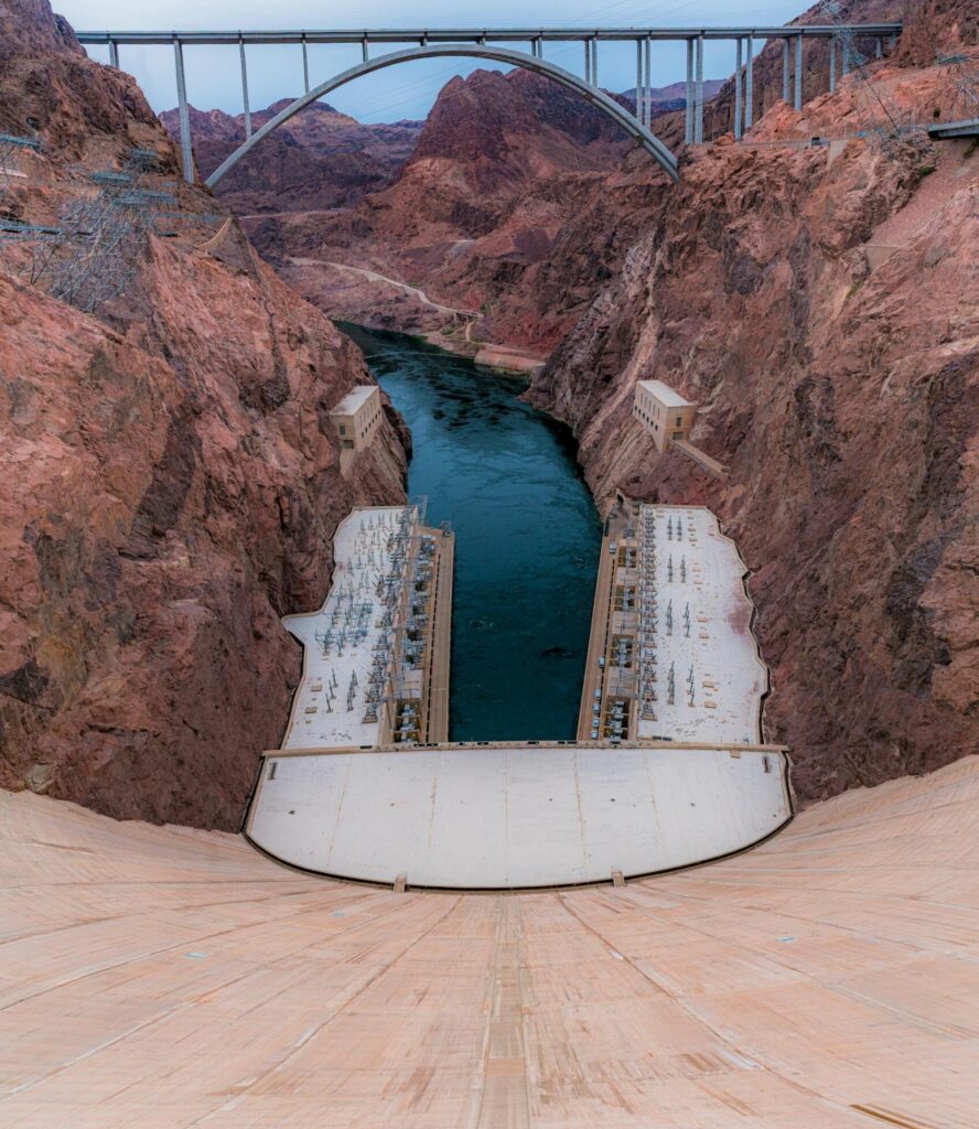 Photo by Mohan Reddy: https://www.pexels.com/photo/hoover-dam-and-memorial-bridge-at-dusk-34794037/